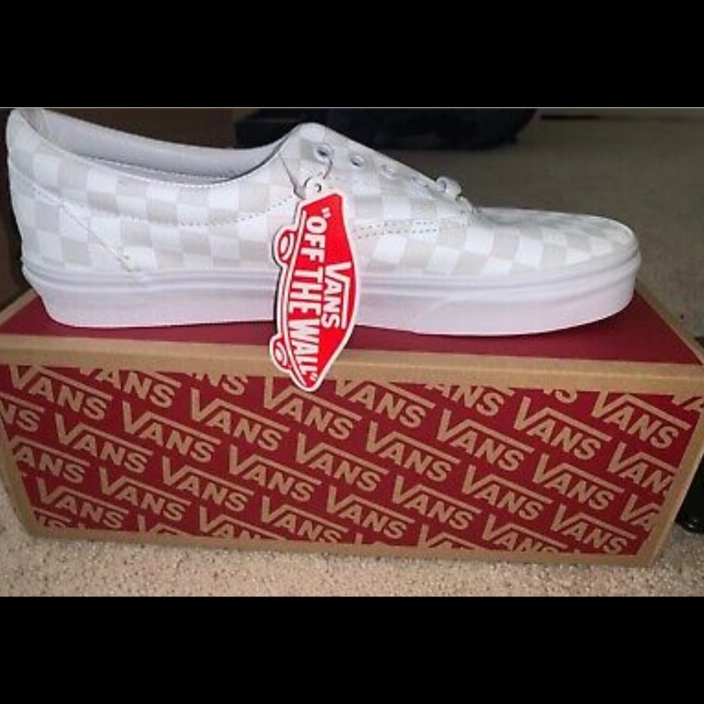 All white checkered vans